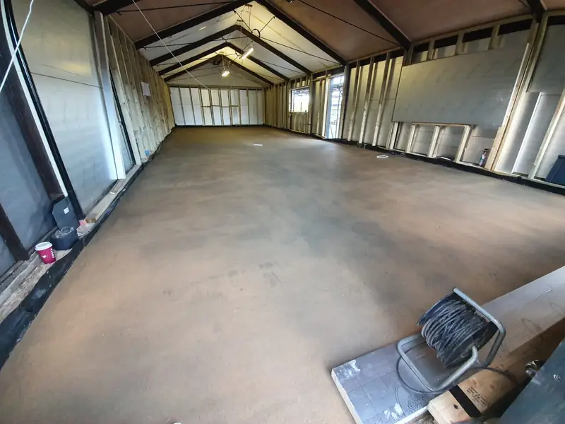 Long vaulted extension with a completed floor screed running the full length